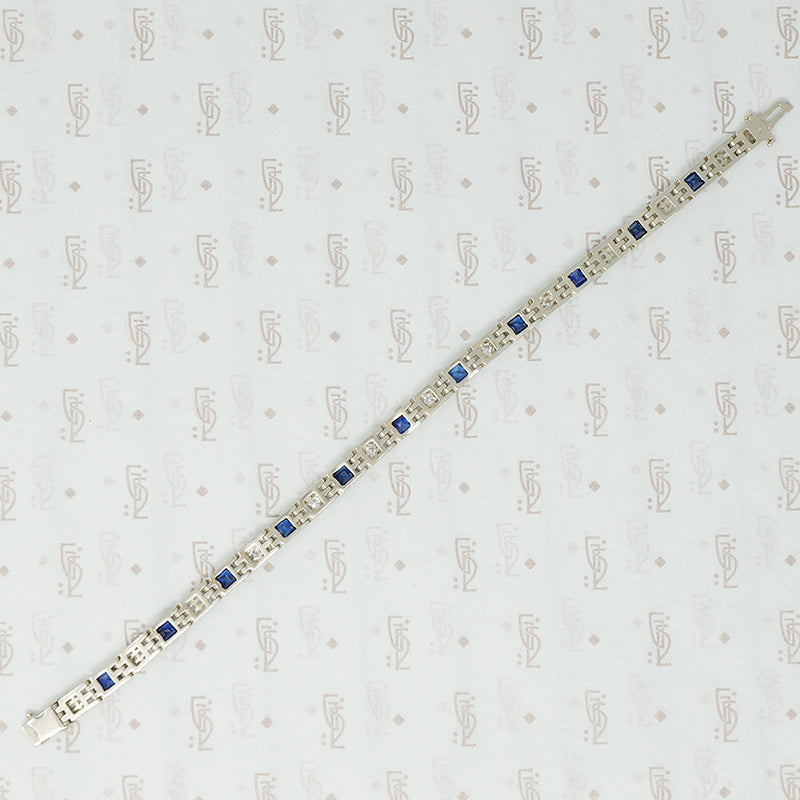 1920's white gold syn sapphire french cut and diamond line bracelet