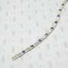 1920's white gold syn sapphire french cut and diamond line bracelet