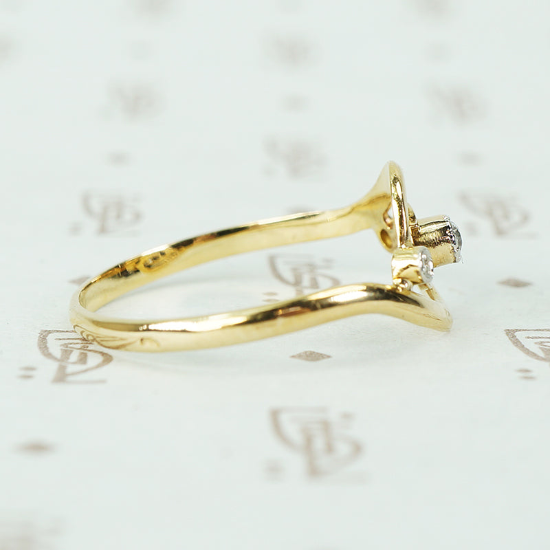 18k yellow gold swirl ring with tiny diamonds set in platinum french hallmarks