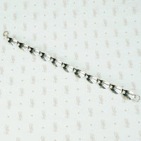 mid century ne from silver bracelet