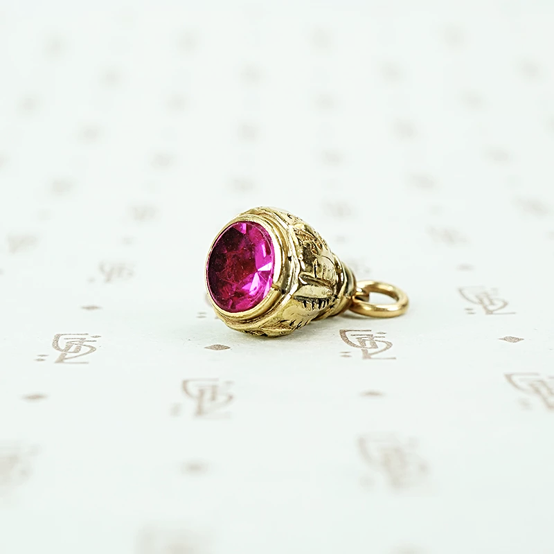 gold filled and fushia glass fob circa 1880