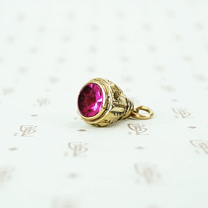 gold filled and fushia glass fob circa 1880