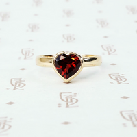 heart shaped garnet ring in 14k yellow gold recycled