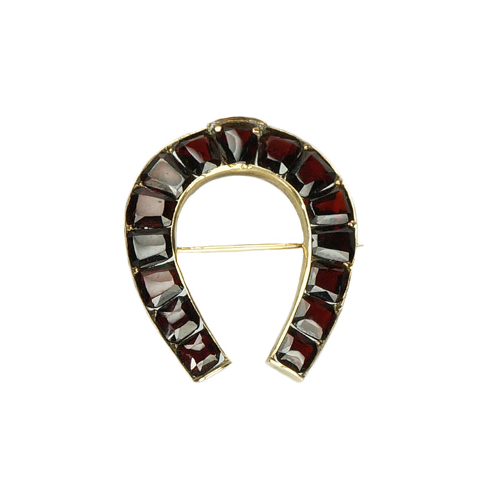 Antique Calibré Cut Garnet Horseshoe Brooch