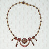 1930's rose cut garnets gold gilded base metal swagnecklace