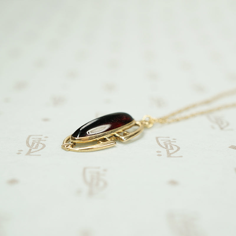 Garnet Cabochon Gold Pendant c1910