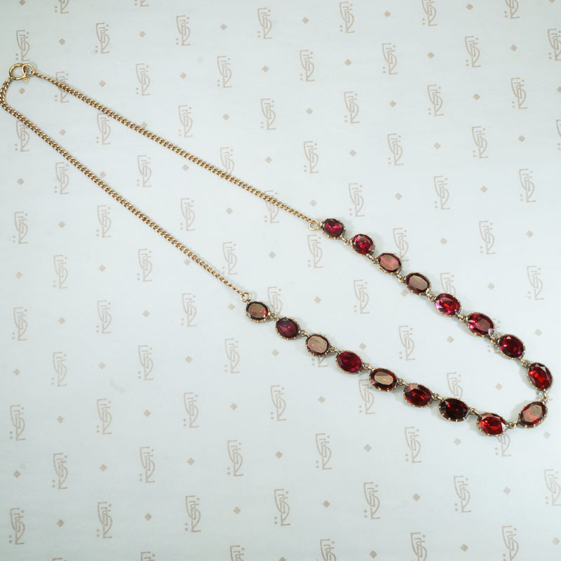 foiled closed back pinched collet flat cut garnet necklace