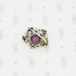 Gold brooch with acanthus leaves a rhodolite garnet and pearls back view