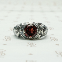 Green Man Garnet Ring in Recycled Silver