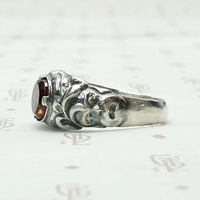 Green Man Garnet Ring in Recycled Silver
