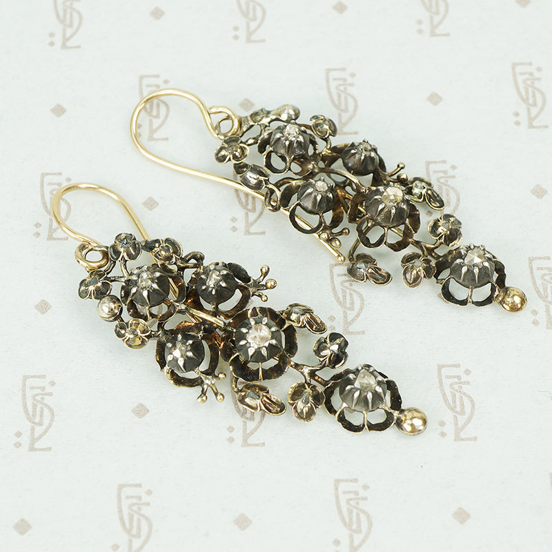 Georgian day and night silver on gold diamond earrings close up
