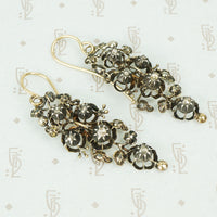 Georgian day and night silver on gold diamond earrings close up