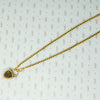 georgian heart lock locket back with garnet carbuncle on gold chain showing crystal cove on back