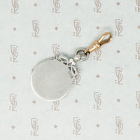 gold and silver sports fob on 9ct hook