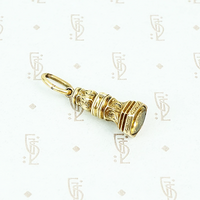 9ct fob with yellow glass stone