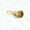 9ct fob with yellow glass stone