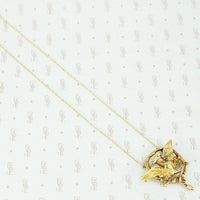 large dragon pendant in yellow fix alloy metal with a rose cut diamond