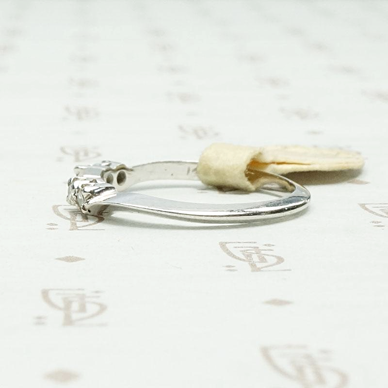 Mid Century Diamond Nesting Wedding Band, left view.