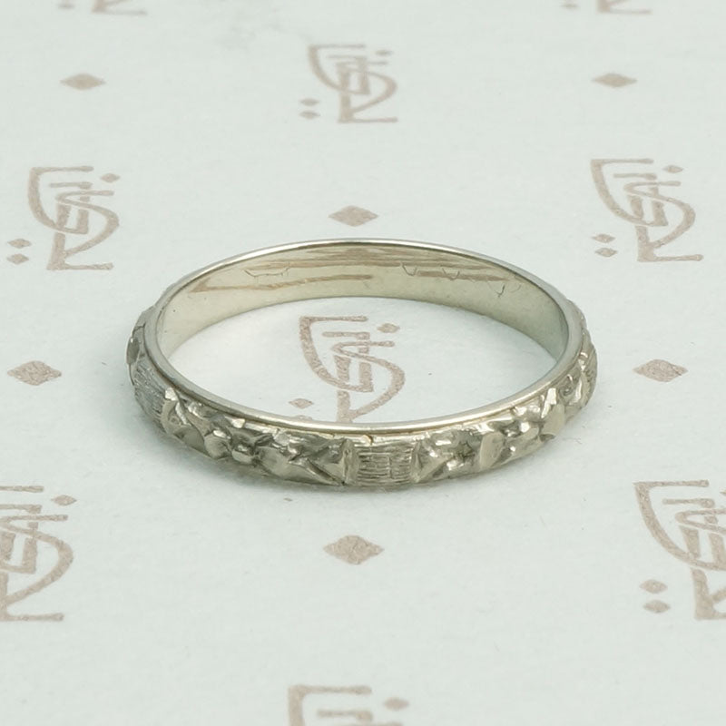 18k White Gold Floral Wedding Band, side view.