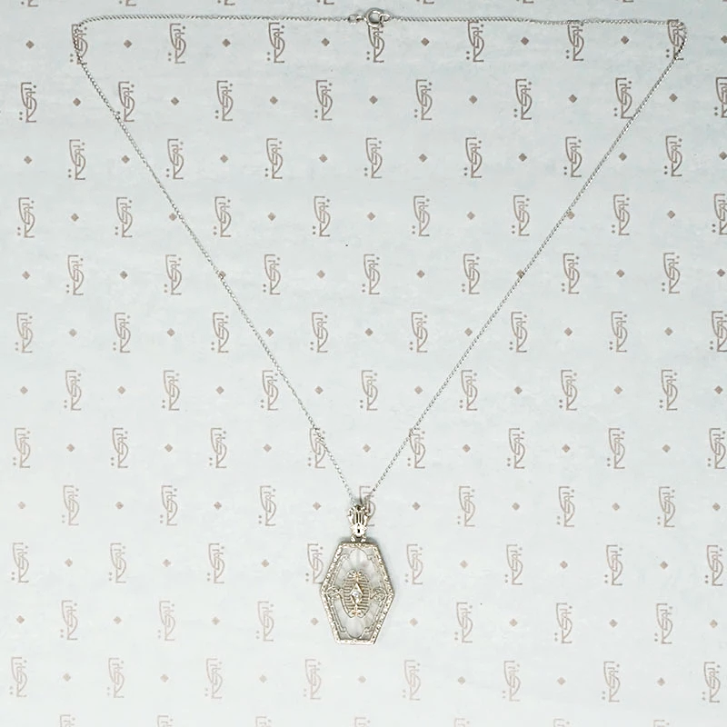 Unusual Camphor Glass in Filigree Necklace