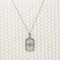 Lacy Filigree Framed Camphor Glass Necklace