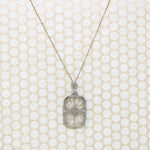 Lacy Filigree Framed Camphor Glass Necklace