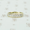 low profile yellow and white gold diamond band