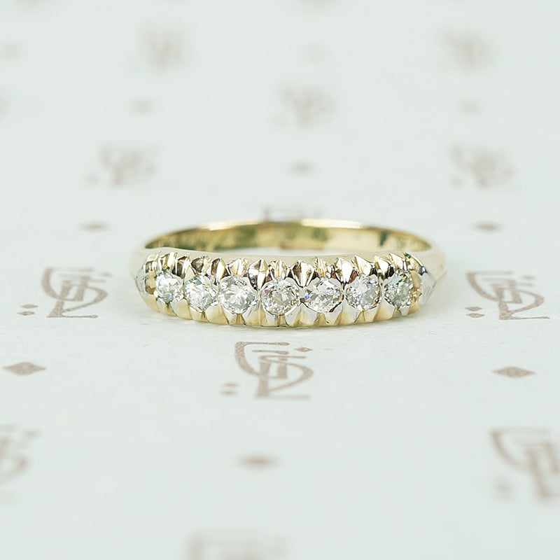 low profile yellow and white gold diamond band