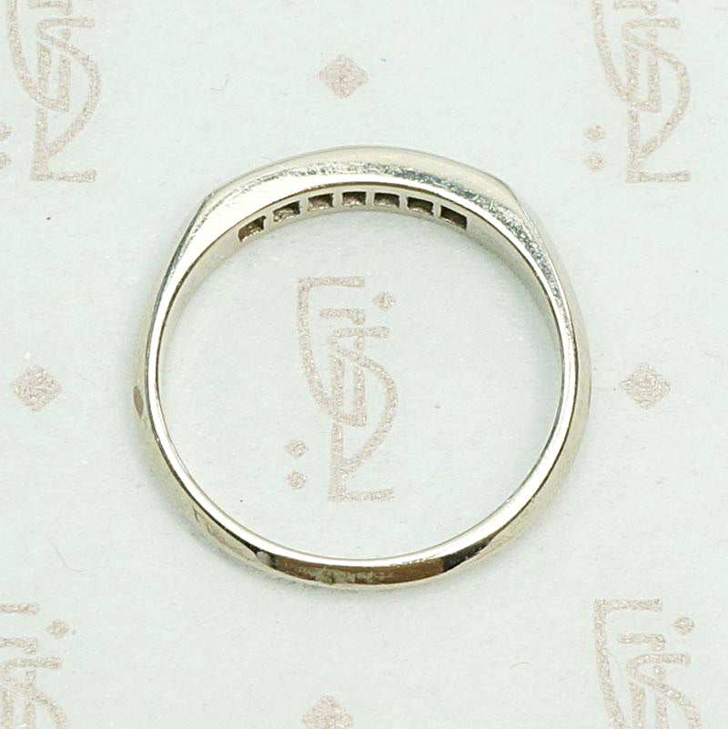 Slim Channel Set Diamond White Gold Band. Top view.
