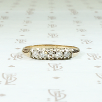 Five Diamond Knife Edge Gold Wedding Band