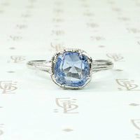 Engraved Platinum Solitaire Ring with Antique Sapphire