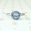Engraved Platinum Solitaire Ring with Antique Sapphire