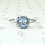 Engraved Platinum Solitaire Ring with Antique Sapphire