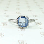 Engraved Platinum Solitaire Ring with Antique Sapphire