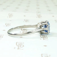 Engraved Platinum Solitaire Ring with Antique Sapphire