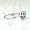 Engraved Platinum Solitaire Ring with Antique Sapphire