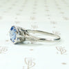 Engraved Platinum Solitaire Ring with Antique Sapphire