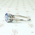 Engraved Platinum Solitaire Ring with Antique Sapphire