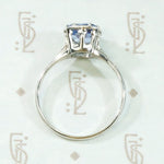 Engraved Platinum Solitaire Ring with Antique Sapphire
