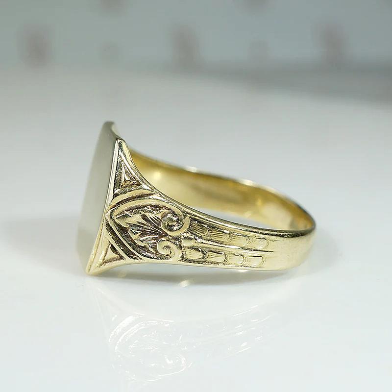Elaborate Foliate Engraved Gold Signet Ring