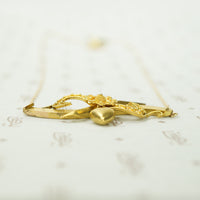 An Arrow a Heart and a Posey Love Token Necklace