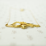 An Arrow a Heart and a Posey Love Token Necklace