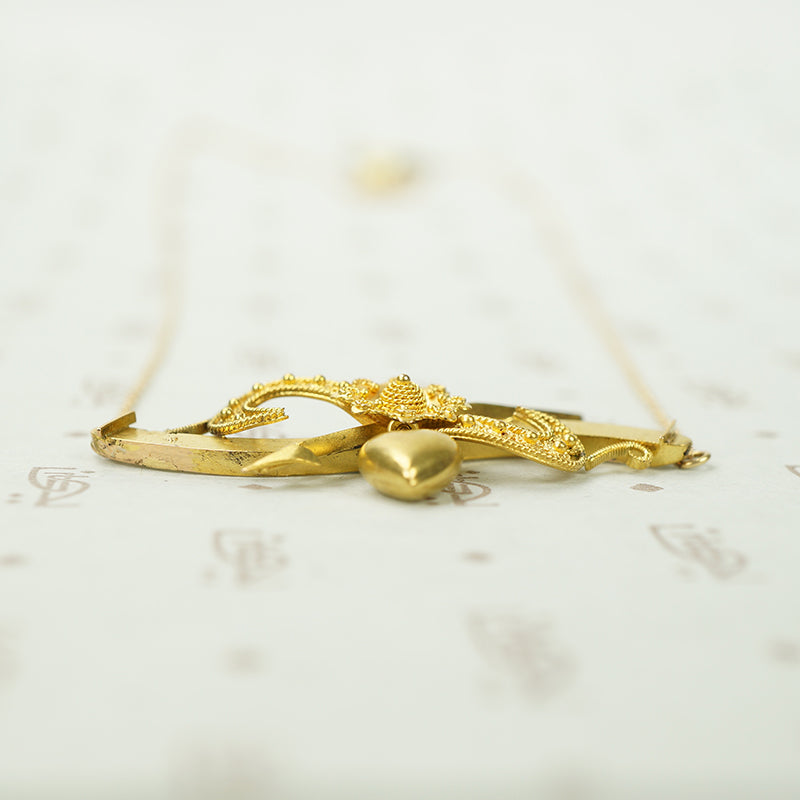 An Arrow a Heart and a Posey Love Token Necklace
