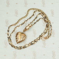 The Heart and Hand Necklace in Rose Gold