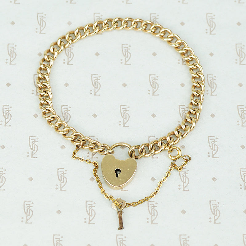 heavy gold filled curb chain bracelet with heart lock and original key