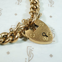 15k Gold Curb Link Bracelet with Heart Lock