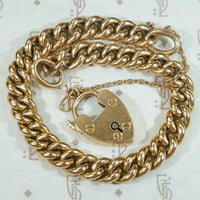 15k Gold Curb Link Bracelet with Heart Lock
