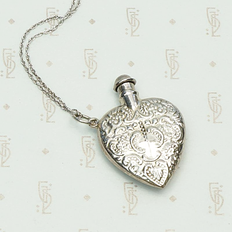 Vintage Valentine Sterling Silver Perfume Bottle Necklace, detail view.