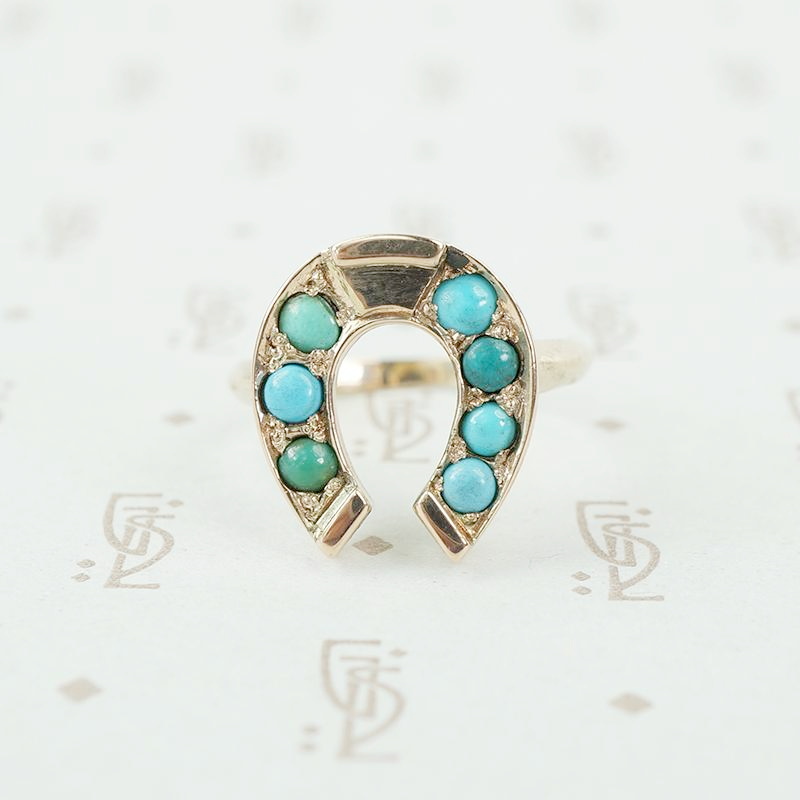 antique horseshoe ring set with turquoise