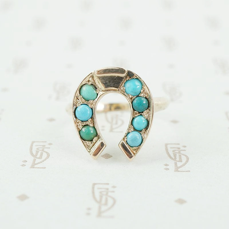 antique horseshoe ring set with turquoise